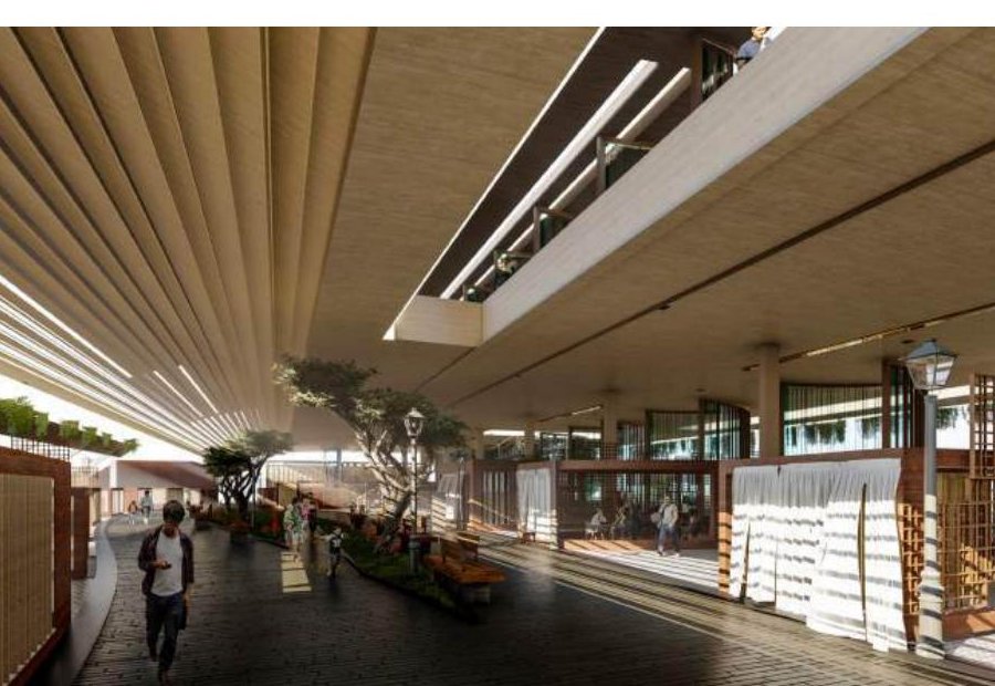 Interior view of the Dynamic Souq, with shaded walkway and curved shop volumes